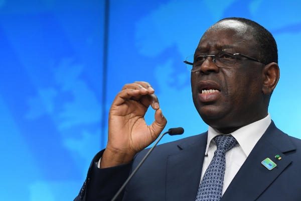 Le président sénégalais Macky Sall à Bruxelles, le 18 février 2022, lors d'une conférence de presse lors du sommet Union européenne-Union africaine.